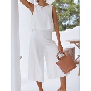 White jumpsuit from Billy J
